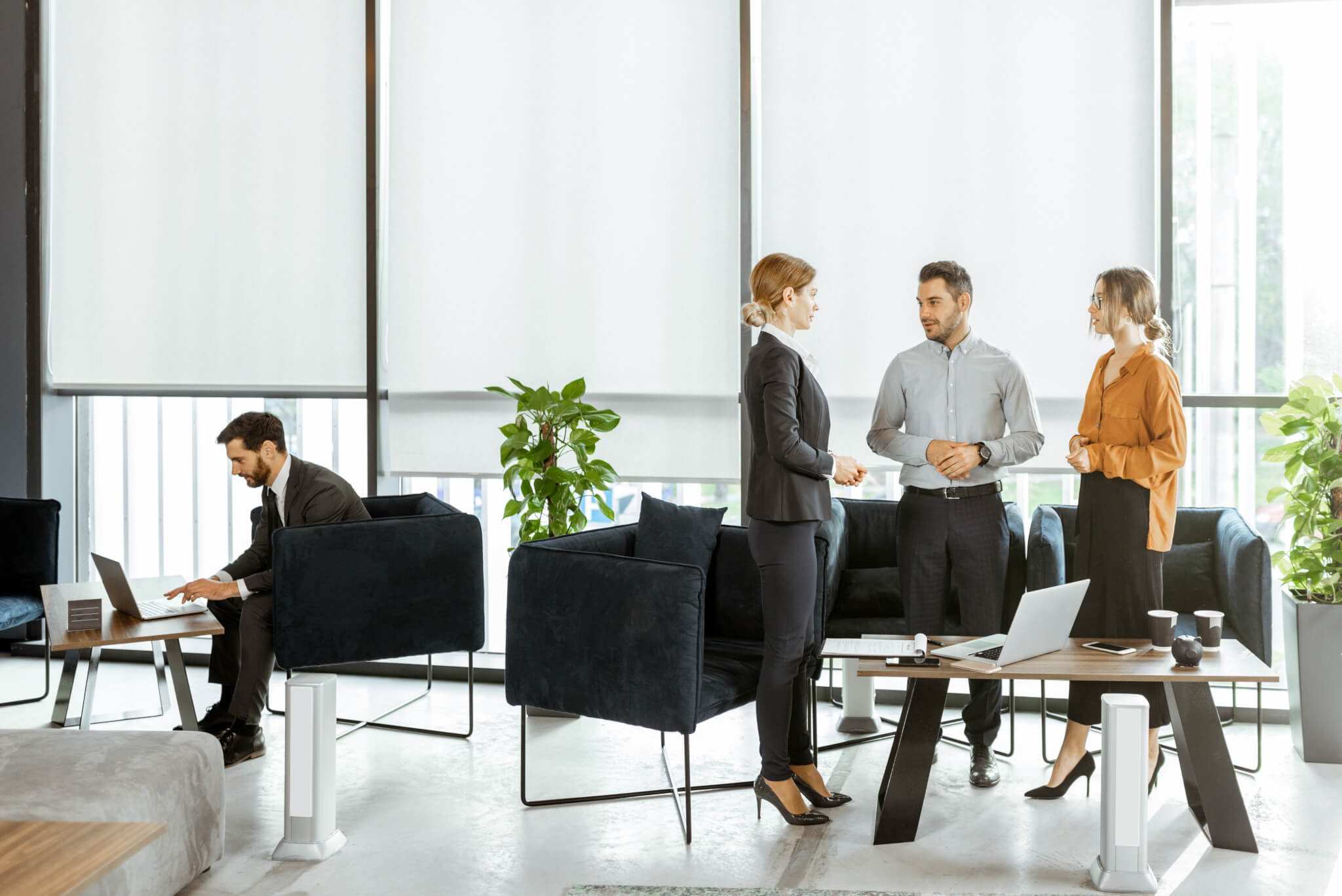 couple-with-business-consultants-at-the-office.jpg